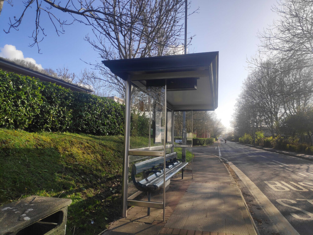 Photo of a bus stop on the road.
